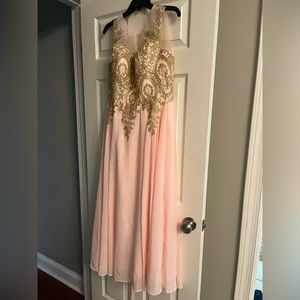 Nice lights pink evening gown. Corset strapped back